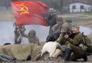 A group of enthusiasts dressed in Soviet and Nazi Germany uniforms take part in the historical reconstruction of one of the battles of World War Two in St.Petersburg